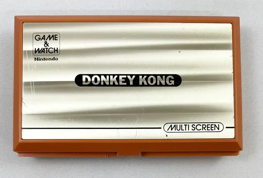 Achetez Aujourd'hui Nintendo Game & Watch - Multi Screen - Donkey Kong (DK-52) Occasion / Fermoir Cassé